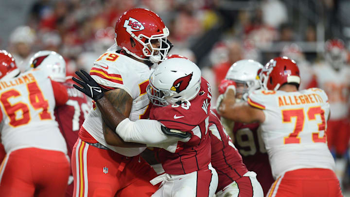 Former Kansas City Chiefs offensive tackle Yasir Durant (79) blocks Arizona Cardinals defensive lineman Reggie Walker (59) during the second half at State Farm Stadium on Aug. 20, 2024. Durant, who is a graduate of Imhotep Charter and one off three athletes from the school to be on a roster for the United Football League, signed to play for the DC Defenders this season. Mandatory Credit: Joe Camporeale-Imagn Images
