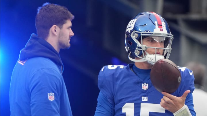 East Rutherford, NJ December 31, 2023 -- Giants quarterbacks Daniel Jones and Tommy DeVito on on the field during pre-game warm-ups. The New York Giants host the Los Angeles Rams on December 31, 2023, at MetLife Stadium in East Rutherford, NJ. East Rutherford, NJ December 31, 2023 -- Giants quarterbacks Daniel Jones and Tommy DeVito on on the field during pre-game warm-ups. The New York Giants host the Los Angeles Rams on December 31, 2023, at MetLife Stadium in East Rutherford, NJ.
