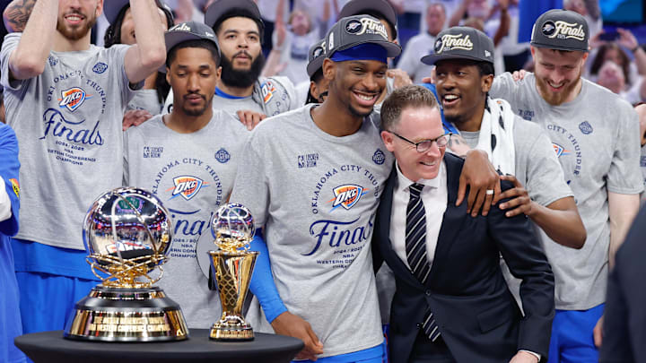 May 28, 2025; Oklahoma City, Oklahoma, USA; Oklahoma City Thunder guard Shai Gilgeous-Alexander hugs Oklahoma City Thunder executive vice president and general manager Sam Presti after their team defeated the Minnesota Timberwolves in game five of the western conference finals for the 2025 NBA Playoffs at Paycom Center.