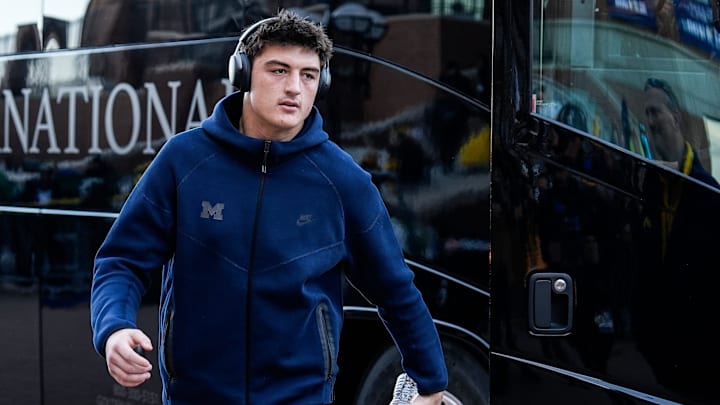Michigan tight end Colston Loveland (18) walks off the bus during team arrival before the Michigan State game at Michigan Stadium in Ann Arbor on Saturday, Oct. 26, 2024.