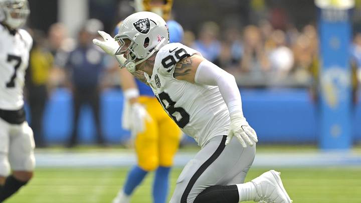 Sep 8, 2024; Inglewood, California, USA; Las Vegas Raiders defensive end Maxx Crosby (98) celebrates after a stop of Los Angeles Chargers quarterback Justin Herbert (10) in the first half at SoFi Stadium. Mandatory Credit: Jayne Kamin-Oncea-Imagn Images