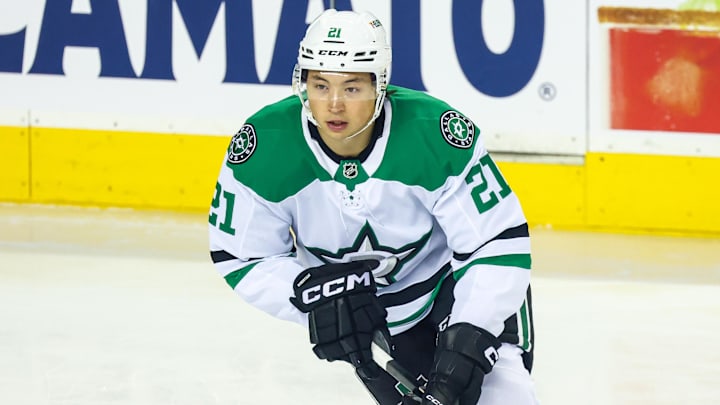 Mar 27, 2025; Calgary, Alberta, CAN; Dallas Stars left wing Jason Robertson (21) skates during the warmup period against the Calgary Flames at Scotiabank Saddledome. Mandatory Credit: Sergei Belski-Imagn Images
