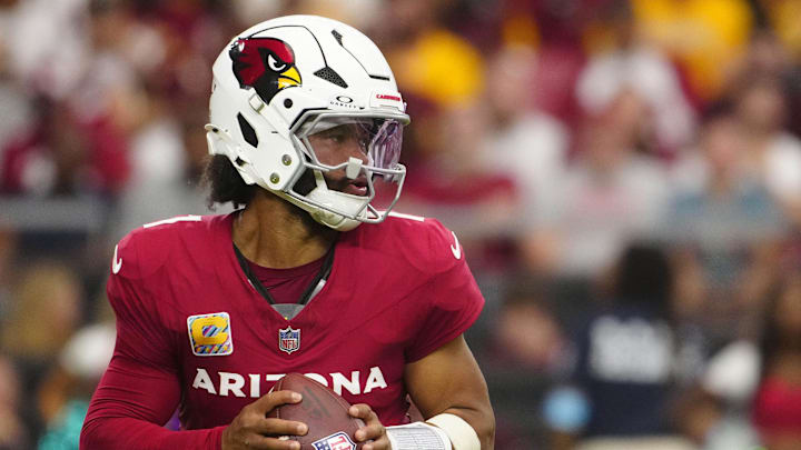 Cardinals quarterback Kyler Murray (1) looks for wide receivers against the Commanders during a game at State Farm Stadium in Glendale on Sept. 29, 2024.