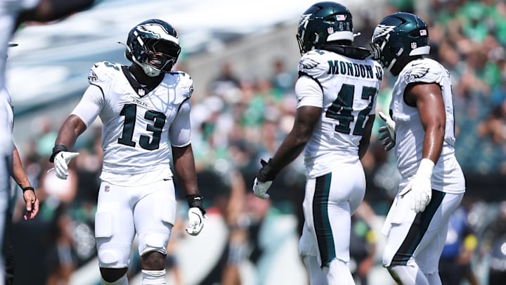 Aug 16, 2025; Philadelphia, Pennsylvania, USA; Philadelphia Eagles linebacker Azeez Ojulari (13) reacts with linebacker Smael Mondon Jr. (42) after a tackle during the second quarter at Lincoln Financial Field. Mandatory Credit: Bill Streicher-Imagn Images Aug 16, 2025; Philadelphia, Pennsylvania, USA; Philadelphia Eagles linebacker Azeez Ojulari (13) reacts with linebacker Smael Mondon Jr. (42) after a tackle during the second quarter at Lincoln Financial Field. Mandatory Credit: Bill Streicher-Imagn Images