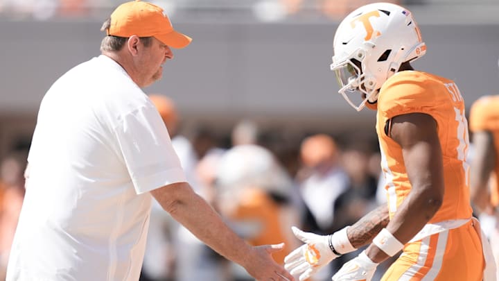 Tennessee coach Josh Heupel high-fives a player before a college football game between Tennessee and UAB at Neyland Stadium in Knoxville, Tenn., on Sept. 20, 2025.