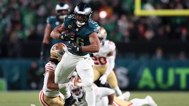 Jan 11, 2026; Philadelphia, PA, USA; San Francisco 49ers linebacker Eric Kendricks (43) tackles Philadelphia Eagles running back Saquon Barkley (26) during the second quarter in an NFC Wild Card Round game at Lincoln Financial Field. Mandatory Credit: Bill Streicher-Imagn Images