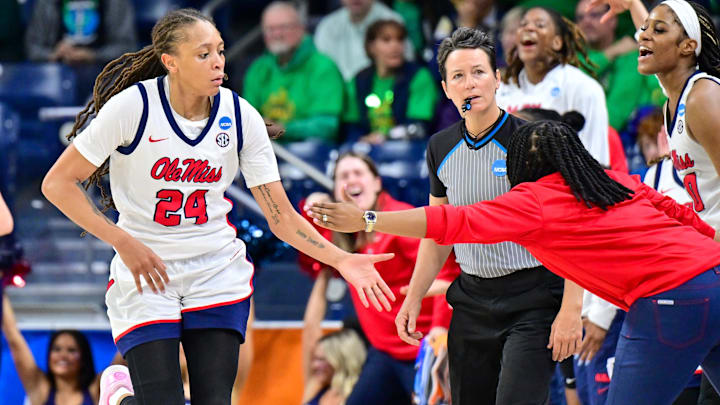 Mar 23, 2024; South Bend, Indiana, USA; Ole Miss Rebels forward Madison Scott (24) celebrates withhead coach Yolett McPhee-McCuin after a basket in the second half against the Marquette Golden Eagles at the Purcell Pavilion. Mandatory Credit: Matt Cashore-Imagn Images Mar 23, 2024; South Bend, Indiana, USA; Ole Miss Rebels forward Madison Scott (24) celebrates withhead coach Yolett McPhee-McCuin after a basket in the second half against the Marquette Golden Eagles at the Purcell Pavilion. Mandatory Credit: Matt Cashore-Imagn Images
