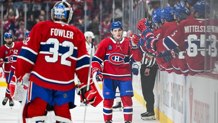 Sep 19, 2026; Montreal, Quebec, CAN;  Montreal Canadiens Lane Hutson defenseman (48) celebrates his goal with his teammates at the bench against the Toronto Maple Leafs during the third period at Bell Centre.  Mandatory Credit: David Kirouac-Imagn Images