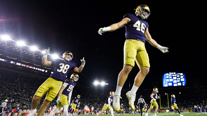 Notre Dame linebacker Jerry Rullo (46) hypes up the crowd after a kickoff in the second half of a NCAA football game against Syracuse at Notre Dame Stadium on Saturday, Nov. 22, 2025, in South Bend. Notre Dame linebacker Jerry Rullo (46) hypes up the crowd after a kickoff in the second half of a NCAA football game against Syracuse at Notre Dame Stadium on Saturday, Nov. 22, 2025, in South Bend.