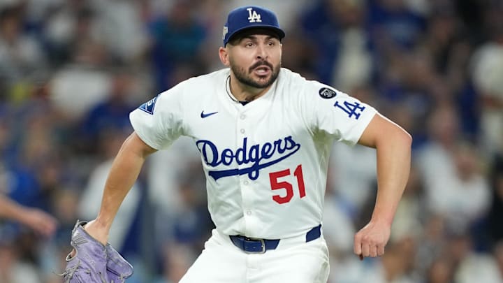 Oct 17, 2025; Los Angeles, California, USA; Los Angeles Dodgers pitcher Alex Vesia (51) reacts in the seventh inning against the Milwaukee Brewers during game four of the NLCS round for the 2025 MLB playoffs at Dodger Stadium. Mandatory Credit: Kirby Lee-Imagn Images Oct 17, 2025; Los Angeles, California, USA; Los Angeles Dodgers pitcher Alex Vesia (51) reacts in the seventh inning against the Milwaukee Brewers during game four of the NLCS round for the 2025 MLB playoffs at Dodger Stadium. Mandatory Credit: Kirby Lee-Imagn Images