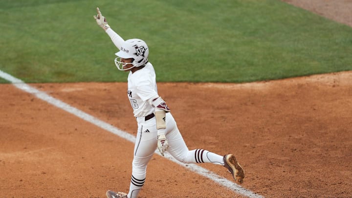 May 9, 2025; Athens, GA, USA; Texas A&M infielder KK Dement (16) reacts to her home run during a game against Texas at Jack Turner Stadium. Mandatory Credit: Mady Mertens-Imagn Images