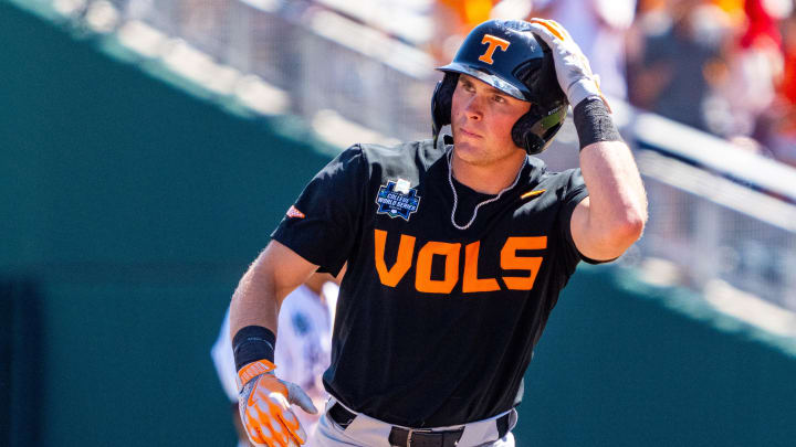 Jun 23, 2024; Omaha, NE, USA; Tennessee Volunteers left fielder Dylan Dreiling (8) circles the bases after hitting a two-run home run against the Texas A&M Aggies during the seventh inning at Charles Schwab Field Omaha. Mandatory Credit: Dylan Widger-USA TODAY Sports
