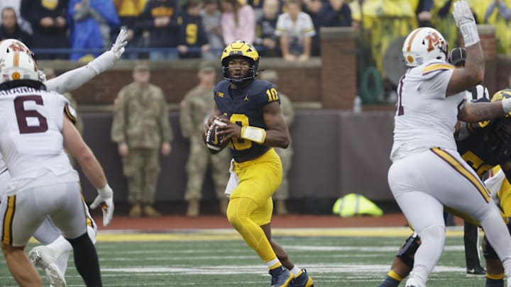 Sep 28, 2024; Ann Arbor, Michigan, USA; Michigan Wolverines quarterback Alex Orji (10) drops back to pass in the second half against the Minnesota Golden Gophers at Michigan Stadium. Mandatory Credit: Rick Osentoski-Imagn Images Sep 28, 2024; Ann Arbor, Michigan, USA; Michigan Wolverines quarterback Alex Orji (10) drops back to pass in the second half against the Minnesota Golden Gophers at Michigan Stadium. Mandatory Credit: Rick Osentoski-Imagn Images