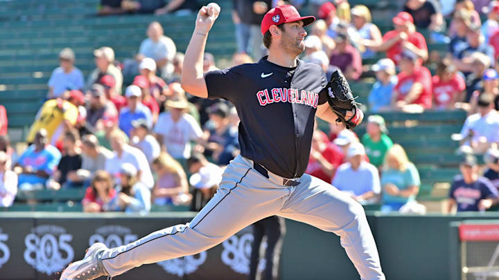 Feb 29, 2024; Tempe, Arizona, USA;  Cleveland Guardians starting pitcher Gavin Williams (32) throws in the first inning against the Los Angeles Angels during a spring training game at Tempe Diablo Stadium. Mandatory Credit: Matt Kartozian-Imagn Images