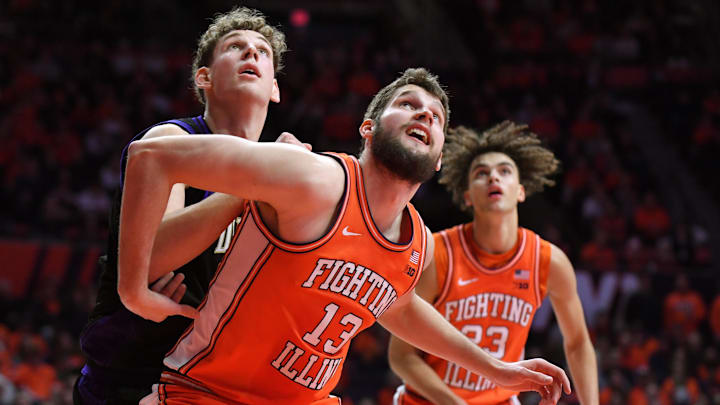 Jan 29, 2026; Champaign, Illinois, USA;  Illinois Fighting Illini center Tomislav Ivisic (13) and Washington Huskies forward Hannes Steinbach (6) battle for position during the second half at State Farm Center. Mandatory Credit: Ron Johnson-Imagn Images