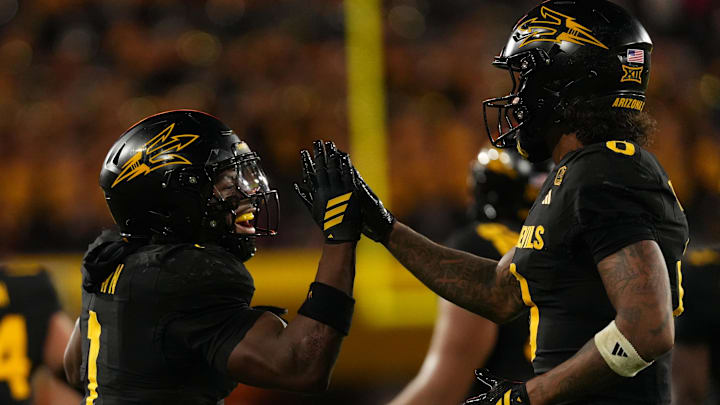 Sep 26, 2025; Tempe, Arizona, USA; Arizona State Sun Devils wide receiver Jordyn Tyson (0) celebrates touchdown with running back Kyson Brown (1) against the TCU Horned Frogs in the second half at Mountain America Stadium, Home of the ASU Sun Devils. Mandatory Credit: Jacob Reiner-Imagn Images