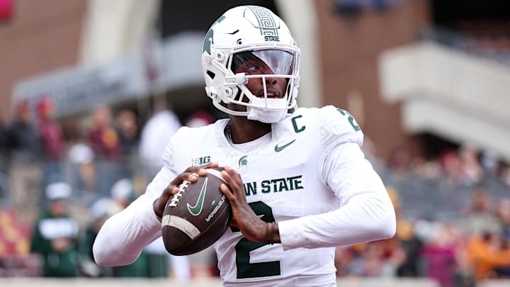 Nov 1, 2025; Minneapolis, Minnesota, USA; Michigan State Spartans quarterback Aidan Chiles (2) warms up before the game against the Minnesota Golden Gophers at Huntington Bank Stadium. Mandatory Credit: Matt Krohn-Imagn Images Nov 1, 2025; Minneapolis, Minnesota, USA; Michigan State Spartans quarterback Aidan Chiles (2) warms up before the game against the Minnesota Golden Gophers at Huntington Bank Stadium. Mandatory Credit: Matt Krohn-Imagn Images