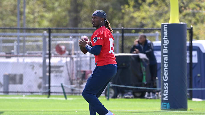 May 11, 2024; Foxborough, MA, USA; New England Patriots quarterback Joe Milton III (19) throws a pass at the New England Patriots rookie camp at Gillette Stadium.  Mandatory Credit: Eric Canha-USA TODAY Sports
