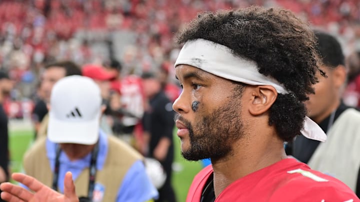 Sep 14, 2025; Glendale, Arizona, USA;  Arizona Cardinals quarterback Kyler Murray (1) walks off the field after the win against the Carolina Panthers at State Farm Stadium. Mandatory Credit: Matt Kartozian-Imagn Images