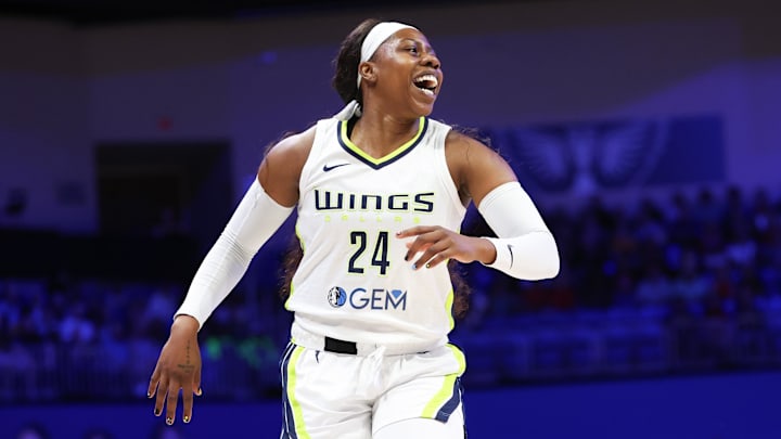 Jul 17, 2024; Arlington, Texas, USA; Dallas Wings guard Arike Ogunbowale (24) reacts during the game against the Indiana Fever at College Park Center. Mandatory Credit: Kevin Jairaj-Imagn Images