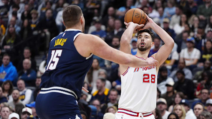 Dec 15, 2025; Denver, Colorado, USA; Houston Rockets center Alperen Sengun (28) shoots the ball over Denver Nuggets center Nikola Jokic (15) n the first quarter at Ball Arena. Mandatory Credit: Ron Chenoy-Imagn Images Dec 15, 2025; Denver, Colorado, USA; Houston Rockets center Alperen Sengun (28) shoots the ball over Denver Nuggets center Nikola Jokic (15) n the first quarter at Ball Arena. Mandatory Credit: Ron Chenoy-Imagn Images
