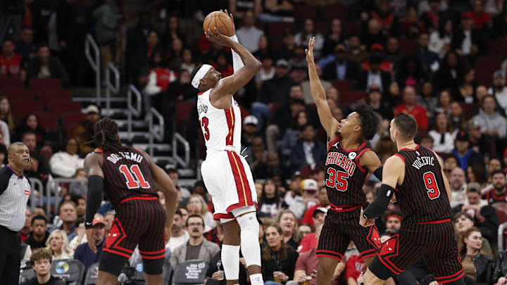 Nov 21, 2025; Chicago, Illinois, USA; Miami Heat center Bam Adebayo (13) shoots against the Chicago Bulls during the first half at United Center. Mandatory Credit: Kamil Krzaczynski-Imagn Images Nov 21, 2025; Chicago, Illinois, USA; Miami Heat center Bam Adebayo (13) shoots against the Chicago Bulls during the first half at United Center. Mandatory Credit: Kamil Krzaczynski-Imagn Images