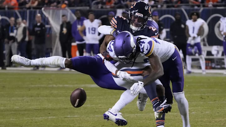 Jay Ward breaks up a pass to DJ Moor by Caleb Williams in Monday night's Bears loss.