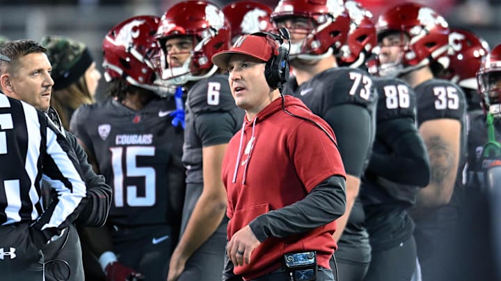 Nov 9, 2024; Pullman, Washington, USA; Washington State Cougars head coach Jake Dickert watches the video board during a game against the Utah State Aggies in the first half at Gesa Field at Martin Stadium. Mandatory Credit: James Snook-Imagn Images Nov 9, 2024; Pullman, Washington, USA; Washington State Cougars head coach Jake Dickert watches the video board during a game against the Utah State Aggies in the first half at Gesa Field at Martin Stadium. Mandatory Credit: James Snook-Imagn Images
