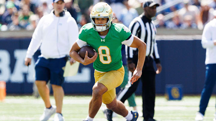 Notre Dame quarterback Kenny Minchey runs the ball during the Notre Dame Blue-Gold spring football game at Notre Dame Stadium on Saturday, April 12, 2025, in South Bend. Notre Dame quarterback Kenny Minchey runs the ball during the Notre Dame Blue-Gold spring football game at Notre Dame Stadium on Saturday, April 12, 2025, in South Bend.