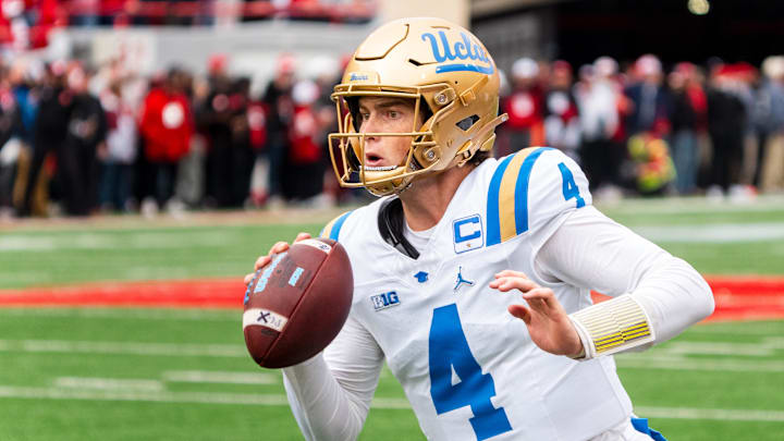 Nov 2, 2024; Lincoln, Nebraska, USA; UCLA Bruins quarterback Ethan Garbers (4) scrambles out of bounds against the Nebraska Cornhuskers during the first quarter at Memorial Stadium. Mandatory Credit: Dylan Widger-Imagn Images Nov 2, 2024; Lincoln, Nebraska, USA; UCLA Bruins quarterback Ethan Garbers (4) scrambles out of bounds against the Nebraska Cornhuskers during the first quarter at Memorial Stadium. Mandatory Credit: Dylan Widger-Imagn Images