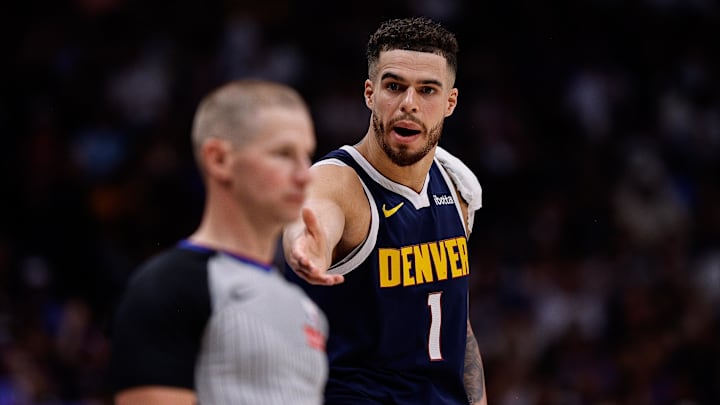 May 11, 2025; Denver, Colorado, USA; Denver Nuggets forward Michael Porter Jr. (1) gestures to referee Tyler Ford in the second quarter against the Oklahoma City Thunder during game four of the second round of the 2025 NBA Playoffs at Ball Arena. Mandatory Credit: Isaiah J. Downing-Imagn Images May 11, 2025; Denver, Colorado, USA; Denver Nuggets forward Michael Porter Jr. (1) gestures to referee Tyler Ford in the second quarter against the Oklahoma City Thunder during game four of the second round of the 2025 NBA Playoffs at Ball Arena. Mandatory Credit: Isaiah J. Downing-Imagn Images