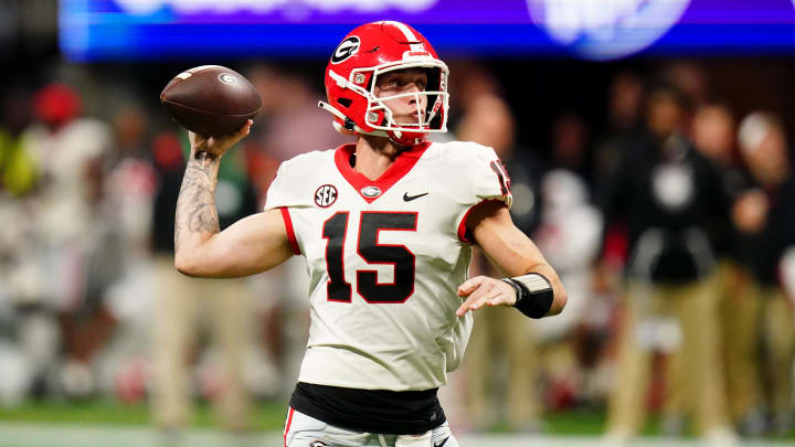 Dec 2, 2023; Atlanta, GA, USA; Georgia Bulldogs quarterback Carson Beck (15) throws a pass against the Alabama Crimson Tide in the third quarter of the SEC Championship at Mercedes-Benz Stadium. Mandatory Credit: John David Mercer-USA TODAY Sports Dec 2, 2023; Atlanta, GA, USA; Georgia Bulldogs quarterback Carson Beck (15) throws a pass against the Alabama Crimson Tide in the third quarter of the SEC Championship at Mercedes-Benz Stadium. Mandatory Credit: John David Mercer-USA TODAY Sports
