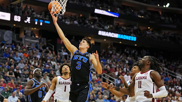 Mar 27, 2025; Newark, NJ, USA; Brigham Young Cougars guard Egor Demin (3) drives to the basket against Alabama Crimson Tide guard Mark Sears (1) during the second half during an East Regional semifinal of the 2025 NCAA tournament at Prudential Center. Mandatory Credit: Robert Deutsch-Imagn Images