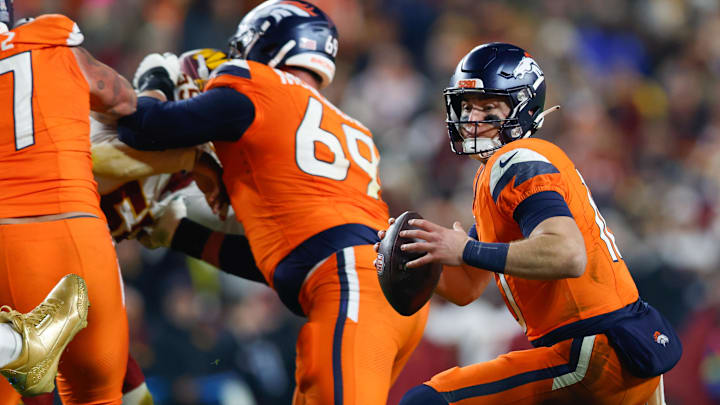Nov 30, 2025; Landover, Maryland, USA; Denver Broncos quarterback Bo Nix (10) scrambles with the ball against the Washington Commanders in the second quarter of the game at Northwest Stadium. Nov 30, 2025; Landover, Maryland, USA; Denver Broncos quarterback Bo Nix (10) scrambles with the ball against the Washington Commanders in the second quarter of the game at Northwest Stadium.