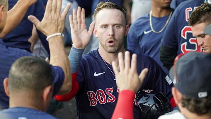 Sep 2, 2023; Kansas City, Missouri, USA; Boston Red Sox shortstop Trevor Story (10) is congratulated