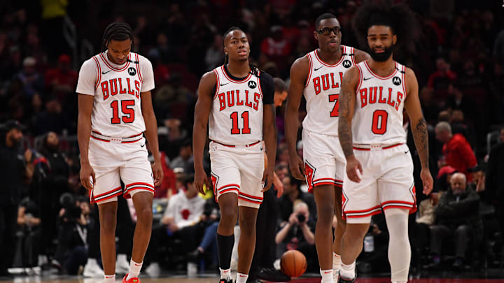 Feb 28, 2025; Chicago, Illinois, USA; (from left to right) Chicago Bulls forward Julian Phillips, guard Ayo Dosunmu, forward Jalen Smith, and guard Coby White are seen during a game against the Toronto Raptors at the United Center. Mandatory Credit: Patrick Gorski-Imagn Images