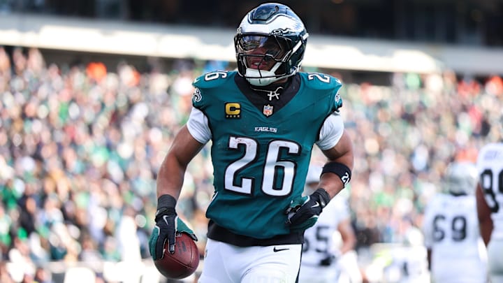 Dec 14, 2025; Philadelphia, Pennsylvania, USA; Philadelphia Eagles running back Saquon Barkley (26) reacts after scoring a touchdown against the Las Vegas Raiders during the second quarter at Lincoln Financial Field. Mandatory Credit: Bill Streicher-Imagn Images