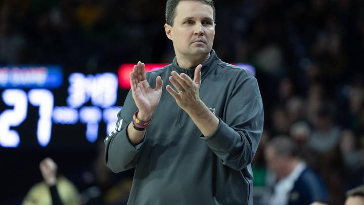 Feb 28, 2026; South Bend, Indiana, USA; NC State Wolfpack head coach Will Wade claps against the Notre Dame Fighting Irish during the first half at Purcell Pavilion at the Joyce Center. Mandatory Credit: Michael Caterina-Imagn Images