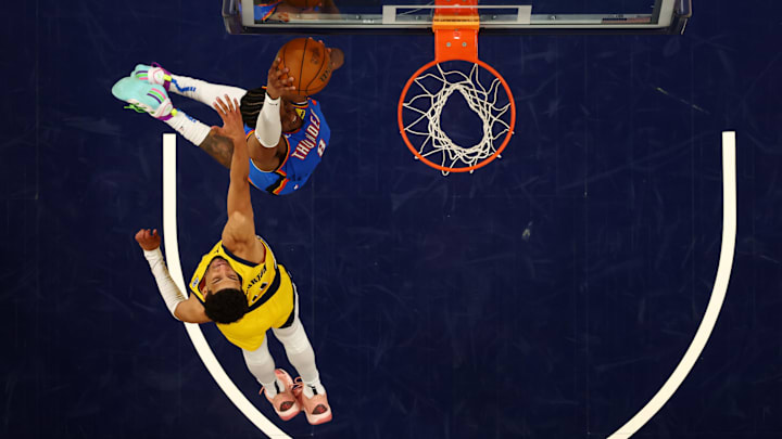 Jun 11, 2025; Indianapolis, Indiana, USA; Oklahoma City Thunder forward Dillon Jones (3) shoots the ball against Indiana Pacers guard Tyrese Haliburton (0) during Game Three of the 2025 NBA Finals at Gainbridge Fieldhouse.