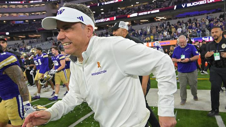 Dec 13, 2025; Inglewood, CA, USA; Washington Huskies head coach Jedd Fisch runs on to the field after defeating the Boise State Broncos in the LA Bowl at SoFi Stadium. Mandatory Credit: Jayne Kamin-Oncea-Imagn Images Dec 13, 2025; Inglewood, CA, USA; Washington Huskies head coach Jedd Fisch runs on to the field after defeating the Boise State Broncos in the LA Bowl at SoFi Stadium. Mandatory Credit: Jayne Kamin-Oncea-Imagn Images