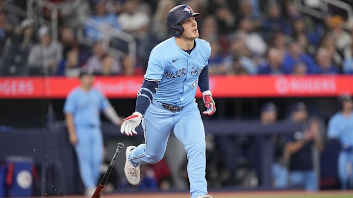 Apr 30, 2025; Toronto, Ontario, CAN; Toronto Blue Jays center fielder Dalton Varsho (5) runs to first base after hitting a two-run home run against the Boston Red Sox during the sixth inning at Rogers Centre. 