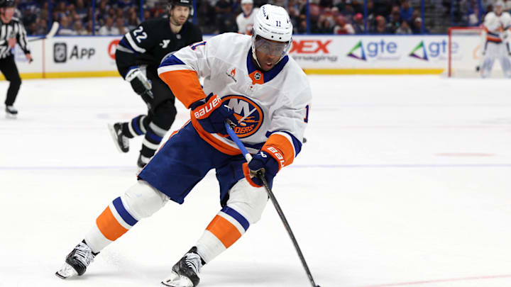 Mar 29, 2025; Tampa, Florida, USA; New York Islanders left wing Anthony Duclair (11) skates with the puck against the Tampa Bay Lightning during the first period at Amalie Arena. Mandatory Credit: Kim Klement Neitzel-Imagn Images Mar 29, 2025; Tampa, Florida, USA; New York Islanders left wing Anthony Duclair (11) skates with the puck against the Tampa Bay Lightning during the first period at Amalie Arena. Mandatory Credit: Kim Klement Neitzel-Imagn Images