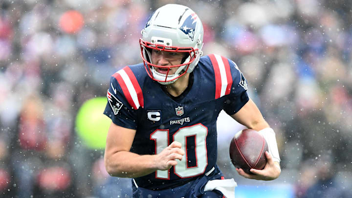 New England Patriots quarterback Drake Maye (10) runs against the Buffalo Bills during the first half at Gillette Stadium. 