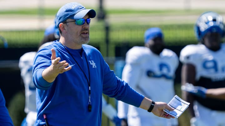 University of Kentucky Defensive Coordinator and Outside Linebackers coach Brad White speaks to the team during spring football practice on Saturday, April 6, 2024.