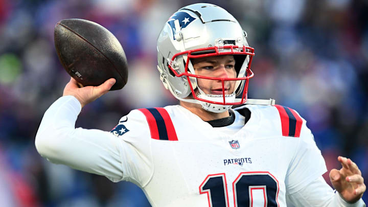 Dec 22, 2024; Orchard Park, New York, USA; New England Patriots quarterback Drake Maye (10) warms up before a game against the Buffalo Bills at Highmark Stadium. Mandatory Credit: Mark Konezny-Imagn Images