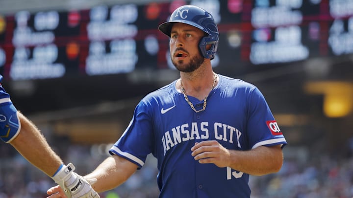Aug 14, 2024; Minneapolis, Minnesota, USA; Kansas City Royals third baseman Paul DeJong (15) celebrates after scoring a run against the Minnesota Twins in the second inning at Target Field. Mandatory Credit: Bruce Kluckhohn-Imagn Images