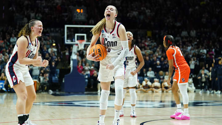 Mar 25, 2024; Storrs, Connecticut, USA; UConn Huskies guard Paige Bueckers (5) reacts after her basket against the Syracuse Orange in the second half at Harry A. Gampel Pavilion. Mandatory Credit: David Butler II-Imagn Images