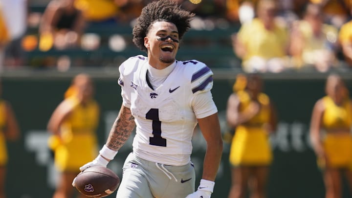 Oct 4, 2025; Waco, Texas, USA;  Kansas State Wildcats wide receiver Jayce Brown (1) reacts after making a catch without his helmet against the Baylor Bears during the second half at McLane Stadium. Mandatory Credit: Chris Jones-Imagn Images