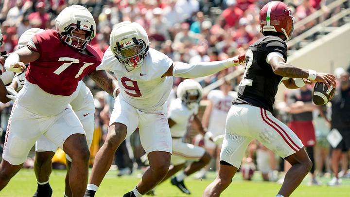 April 11, 2026; Tuscaloosa, AL, USA; Alabama Crimson Tide linebacker Desmond Umeozulu (9) breaks away from a block by Alabama Crimson Tide offensive lineman Nick Brooks (71) to pressure Alabama Crimson Tide quarterback Keelon Russell (12) at Bryant-Denny Stadium during the Alabama A Day scrimmage.