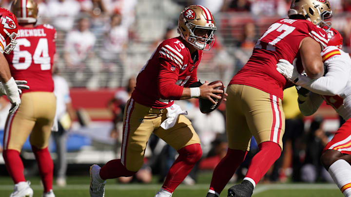Oct 20, 2024; Santa Clara, California, USA; San Francisco 49ers quarterback Brock Purdy (13) runs the ball against the Kansas City Chiefs in the first quarter at Levi's Stadium. Mandatory Credit: Cary Edmondson-Imagn Images